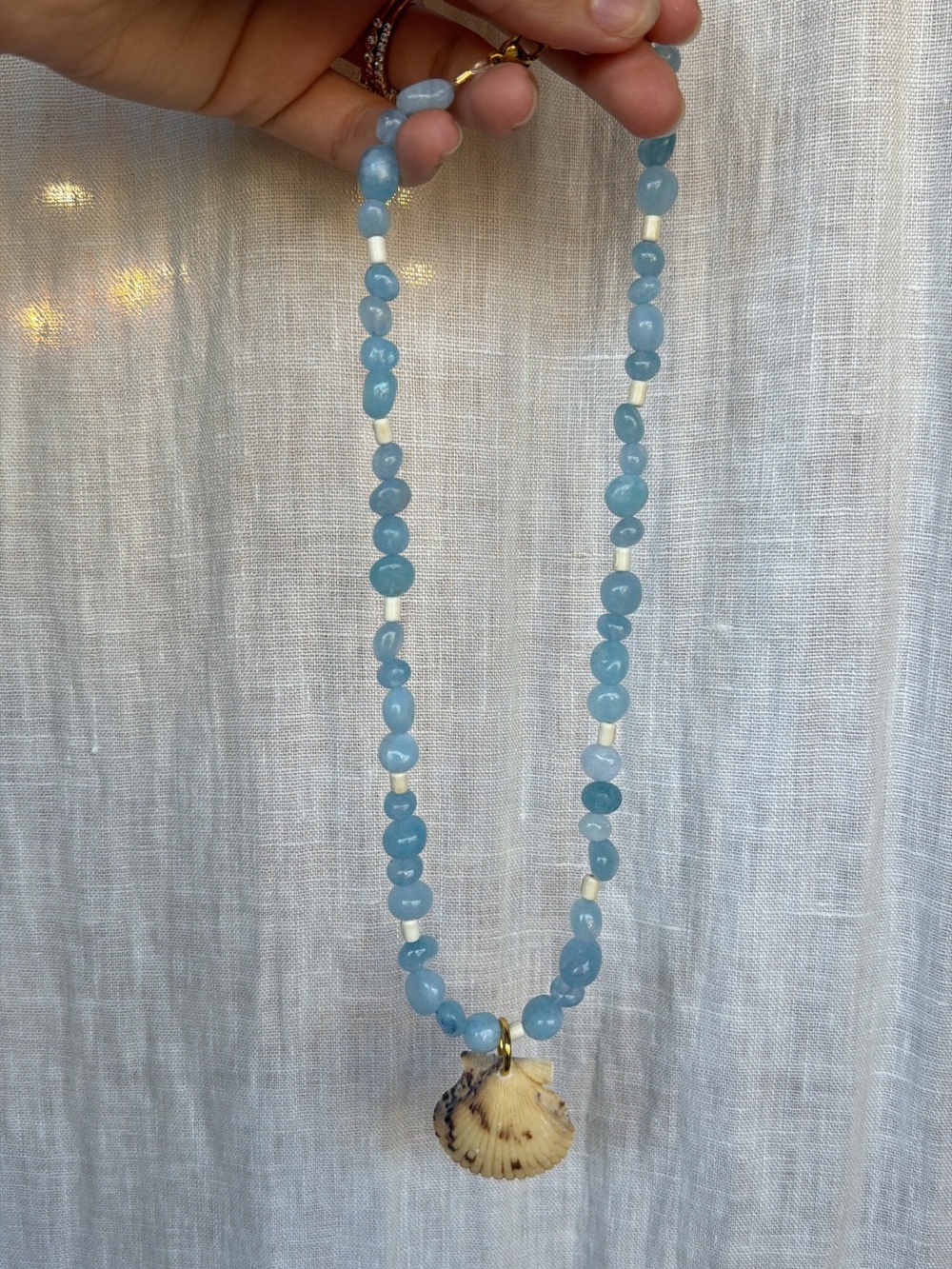 Blue aquamarine beaded necklace with shell